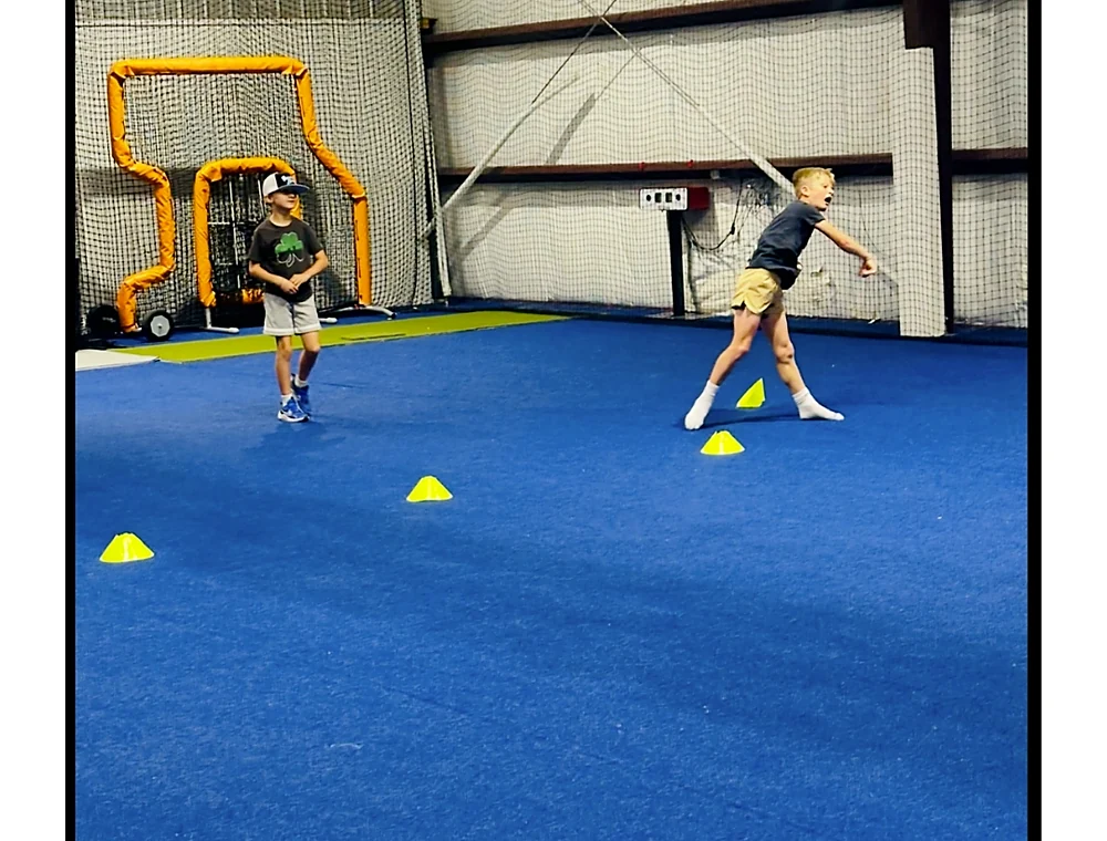 Kids enjoying an indoor group activity at The Boom Boom Room